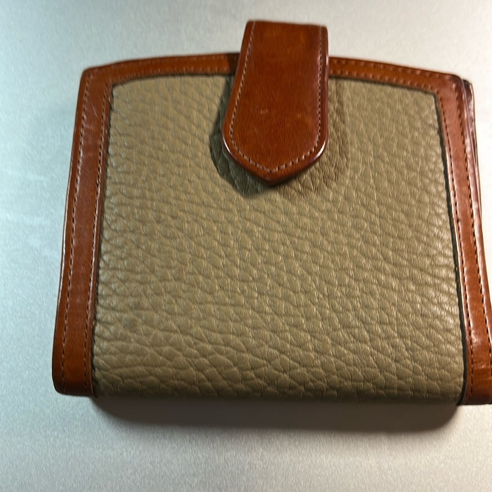 Dooney & Burke vintage wallet. Excellent condition. 4 cc slots, ID window